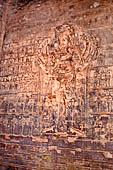 Prasat Kravan - bas reliefs on the brickwork, Vishnou with eight arms.